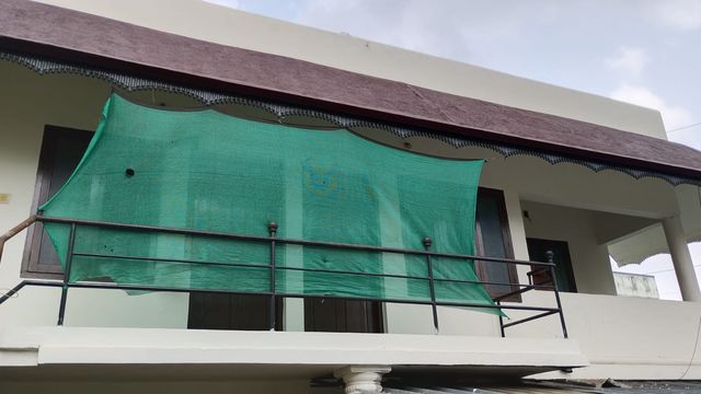 Upstairs balcony with railing at Ashraf Gents Hostel, NAD Road, Kalamassery